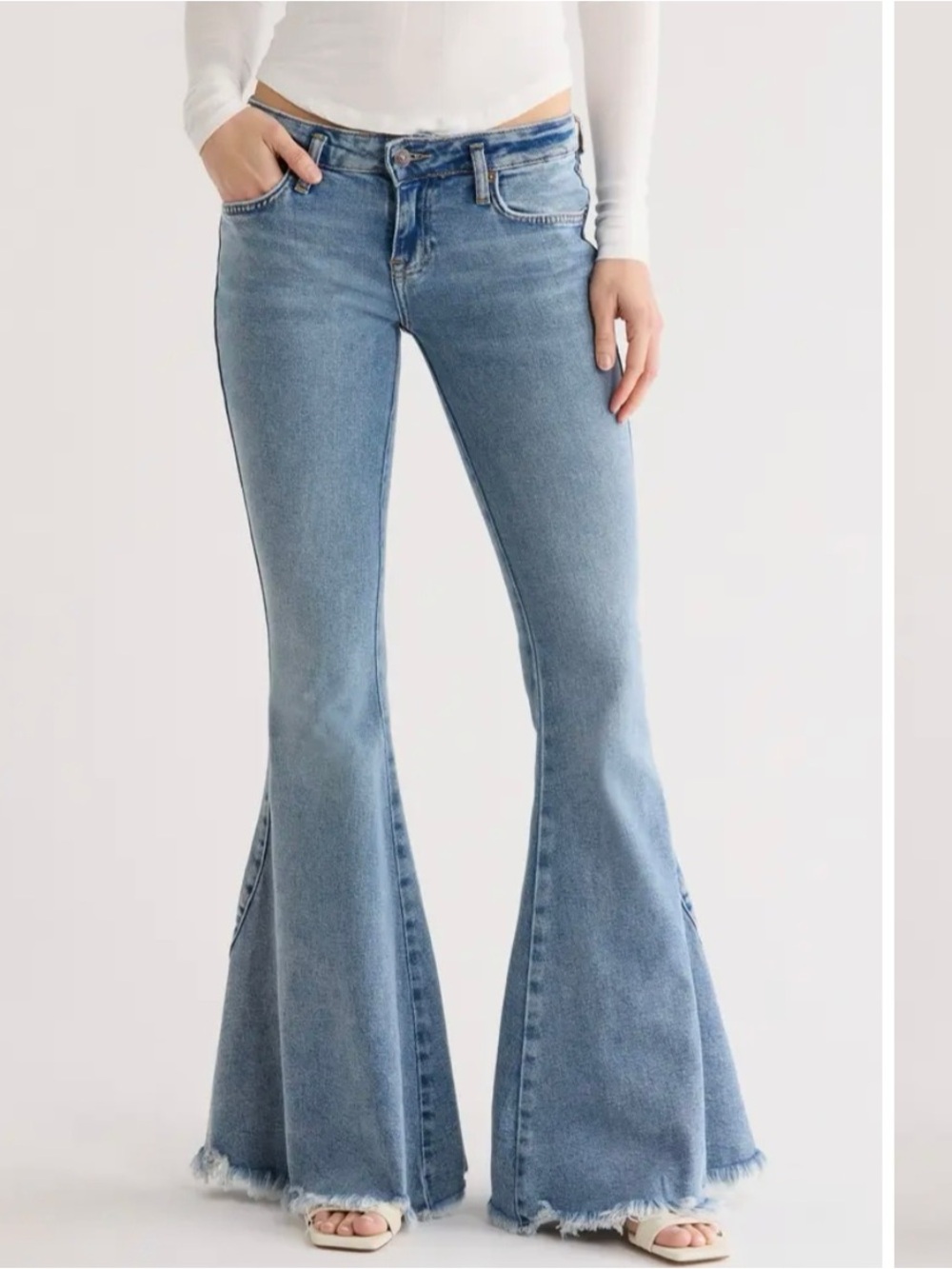 We The Free Light Blue High-Rise Flare Jeans